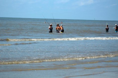 Anglers Avery Comeaux, left, junior and JAke Plante, senior, wait for bites during the fishing teams Redfish roundup event in september at Sea Rim State Park.