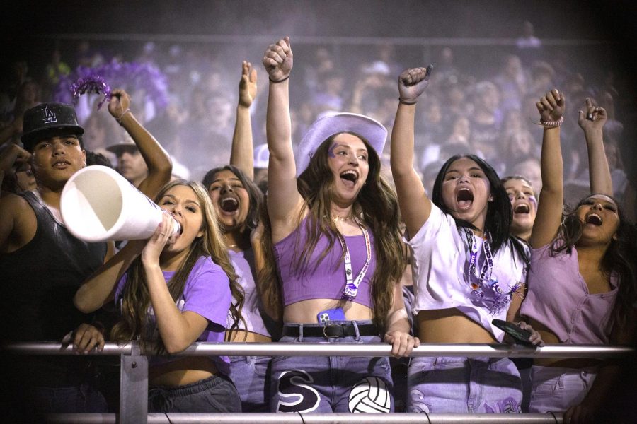 Seniors Amber Mello, Sarah Grove and Mariella Dublon cheer on the Indians as PNG builds it lead in the first half of the annual Mid-County Madness rivalry game with Nederland. (Alice Myers/NDN Press)