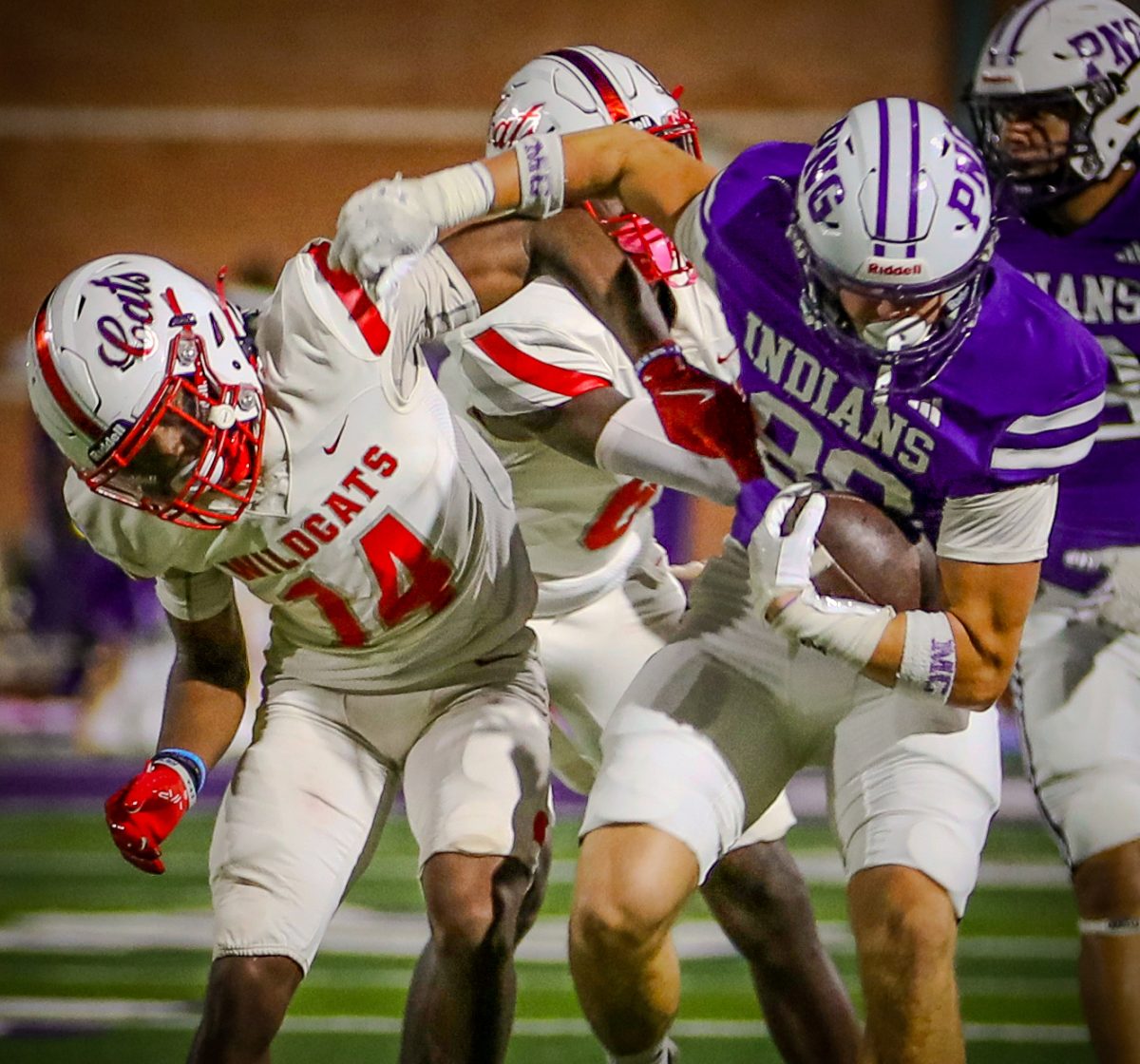 Battling at midfield, wide receiver Tyce Benkert ('27) fights to break free from a Splendora defender after snagging a pass from quarterback Connor Bailey (not pictured) on Friday, Oct. 11, 2024. PNG defeated Splendora, 57-14, for it's 21st-straight win. (Celia Ruiz/NDN Press)