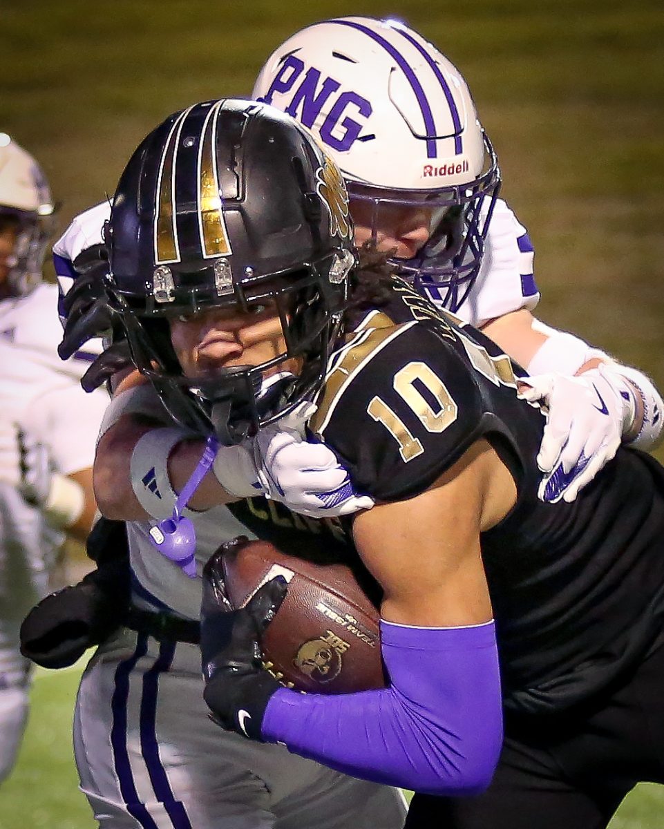 After receiving off an unnecessary roughness call in its first possession of the third quarter, wide receiver Torrin Teague (‘26) takes a pass from Carter Koepecky (‘25) before being met and brought down by defenders Travis Cobb (‘25) and Ryder McLeod (‘27) during the Class 5A-II state quarterfinal game at Stephen F. Austin State University on Friday, Dec. 6, 2024. 

The Bears scored two plays later and eventually pulled further away, leaving the contest as victors, 56-14, and advancing to meet Argyle in the state semifinal round. (Jozlyn Oglesbee/NDN Press)