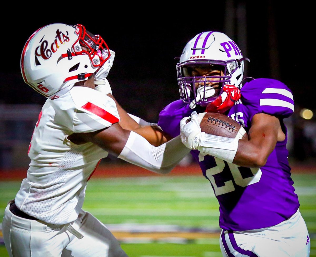 Locking up early in the game, running back Tyson Henry ('27) attempts to ward off a Splendora defender during the Homecoming game on Friday, Oct. 11, 2024. PNG defeated Splendora, 57-14, for it's 21st-straight win. (Jozlyn Oglesbee/NDN Press)