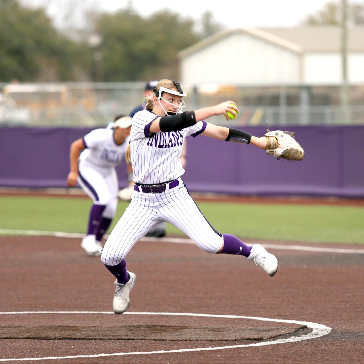 Varsity softball pitcher McKayla Hranicky (‘26) winds up before releasing a pitch against Orangefield during the team’s opening game of their three-day home tournament on Thursday, Feb. 15, 2024. 

The team went 5-1 overall at the tournament, which ran from Thursday through Saturday. 

Adapting to a new rule allowed in softball this season, McKayla added a leap to her pitching move, allowing her to drive off the mound with two feet in the air in order to get more drive and power. 

The team defeated Orangefield, 10-4, as McKayla picked up the win in the circle. (Jozlyn Oglesbee/NDN Press)