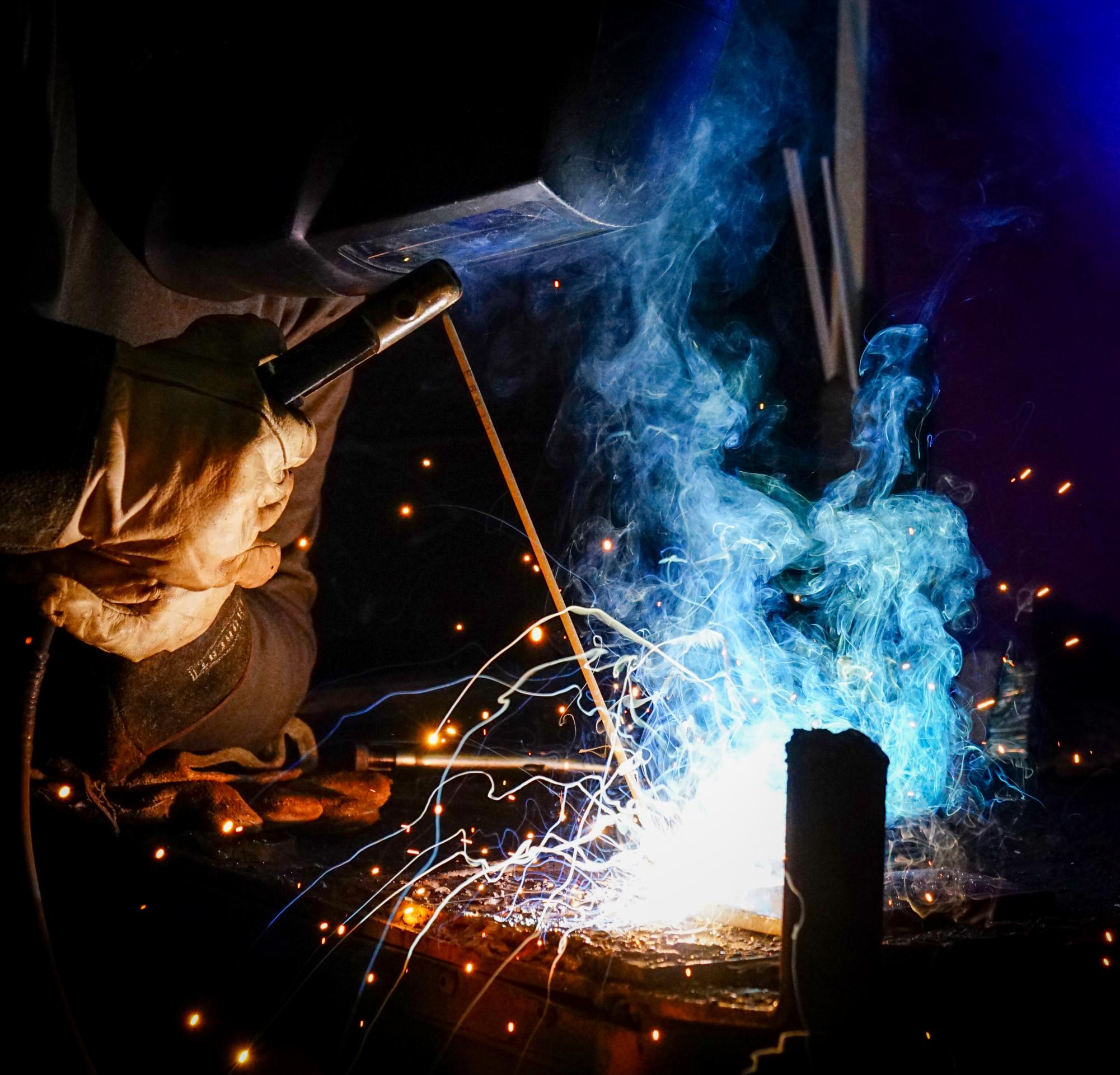 Welding student Justin Vercher ('25) secures two pieces of metal together as Mr. Gordon's class works on its project for the Houston Livestock and Rodeo on Friday, Jan. 17, 2025. This is the first year the school participated in the competition for high school industrial classes to complete a project for the show, which was to build an outdoor grill smoker. (Gabby Garza/NDN Press)