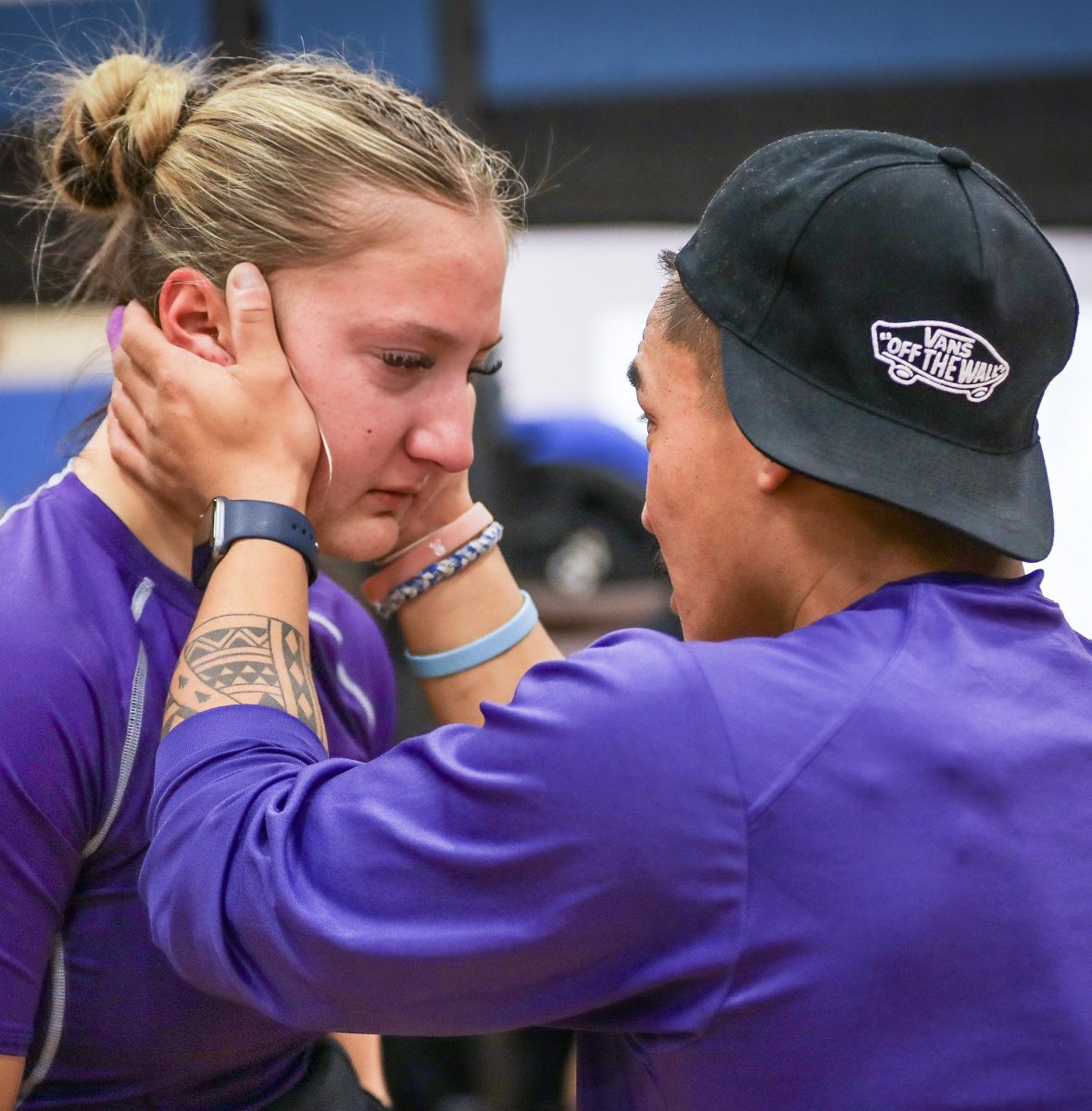 After failing the second of three allowed attemps of 345 lbs. in the squat event, varsity powerlifter McKayla Hranicky ('26) is approached by volunteer coach Kevin Angus during the New Caney Invitational girls powerlifting meet on Saturday, Jan. 17, 2026. It was the PNG Girls Powerlifting team's second powerlifting meet of the year, after hosting — and winning — the PNG Invitational on Jan. 5. The team competed against 15 schools from the North Houston area. Angus rushed to comfort McKayla, encouraging her as she faced on final attempt at the weight. Moments later, McKayla successfully completed her attempt, which, alongside benching 165 lbs. & deadlifting 375 lbs. helped her achieve 1st place in her category. The result helped contribute to the team winning 1st place overall. (Gabby Garza/NDN Press)